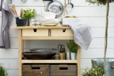 13 a natural-looking outdoor bar of an IKEA Forhoja cart is a great idea for any Scandinavian space
