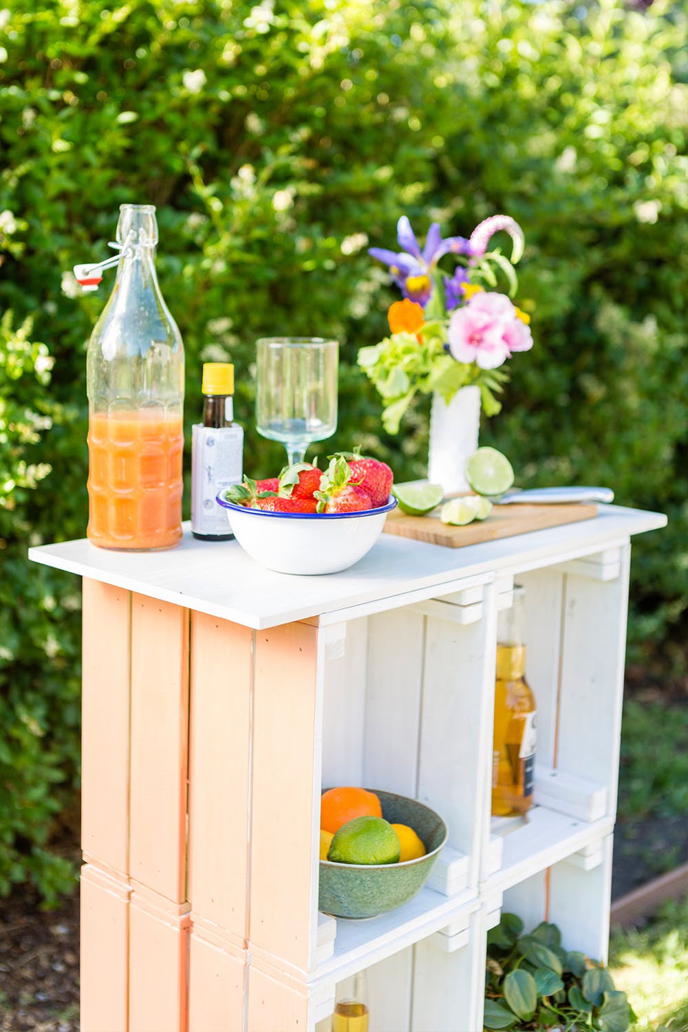 a gorgeous outdoor bar made of 12 IKEA Knagglig boxes to serve cold drinks at parties