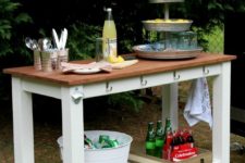 15 make a gorgeous outdoor buffet in rustic style using Lerhamn table from Ikea