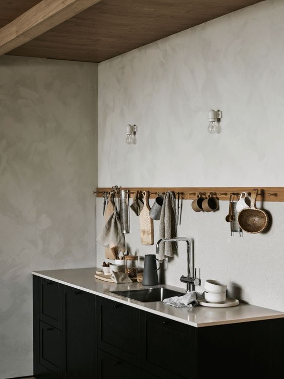 grey plaster is rather neutral but looks textural and more interesting than a plain grey wall