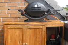 21 Tassa baby changing table with some boards is turned into a stylish grill table
