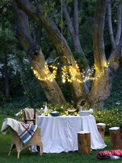 light over the space and some candles on the table for an inviting ambience