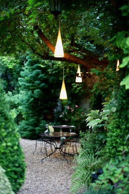 stylish drop-inspired lanterns over the dining space make a statement