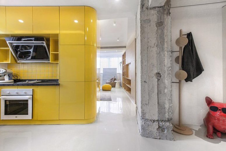 This ultra modern apartment is organized with functional boxes, each with a different function