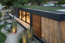 02 The house features a green roof and photovoltaic panels for more sustainability