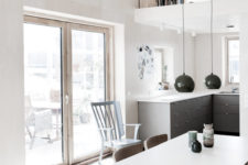 scandinavian open layout where kitchen is combined with dining room
