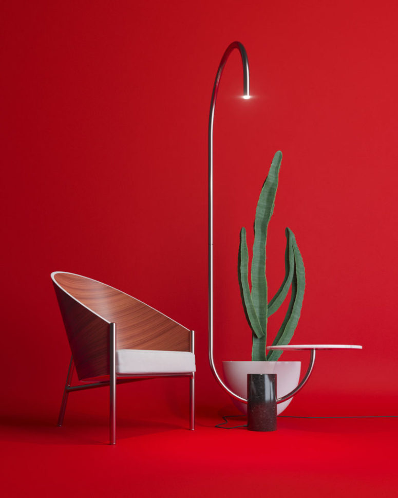 The lamp features a stone base and a curved leg with a light on the edge and an additional side table floating above the floor The lamp features a stone base and a curved leg with a light on the edge and an additional side table floating above the floor