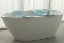 02 The piece includes a doggie tub with some space for storing soaps and a seat for the owner