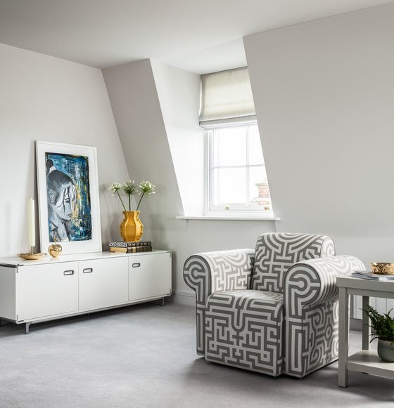 There attic windows and all the spaces are done in off white to create a proper backdrop for bold items There attic windows and all the spaces are done in off-white to create a proper backdrop for bold items