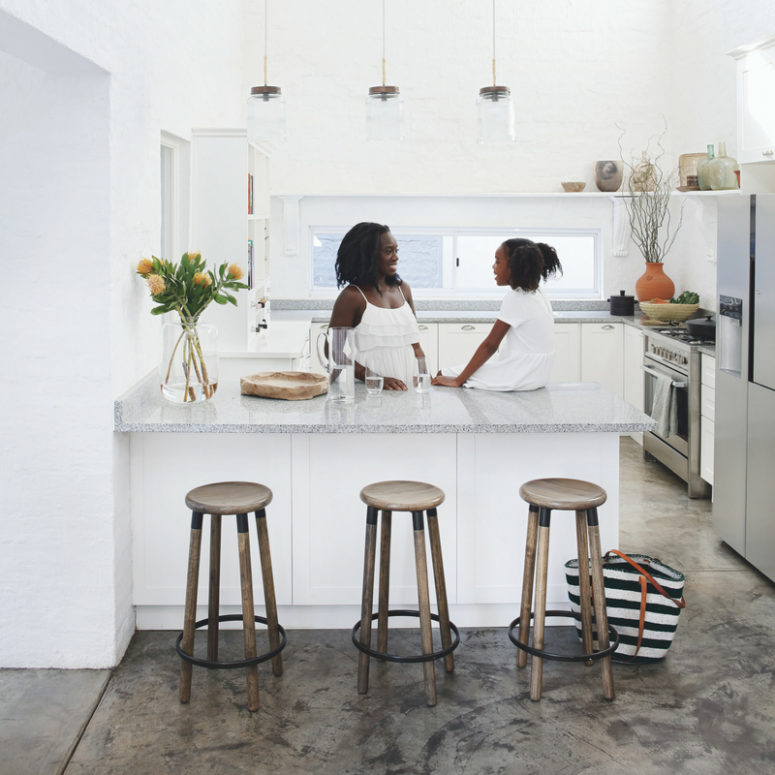 The kitchen is a lit up cozy space with everything necessary and a large kitchen island suitable for having meals here The kitchen is a lit up cozy space with everything necessary and a large kitchen island suitable for having meals here