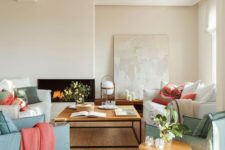 03 a neutral living room done with mint and coral accents will never fail