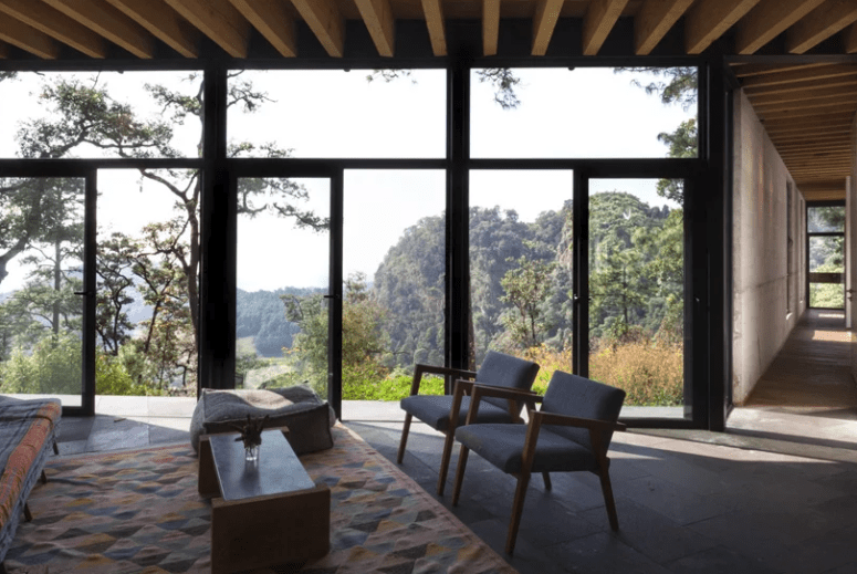 stone mde interiors The indoor spaces are done in stone, concrete and wood with a restraint color palette inspired by nature