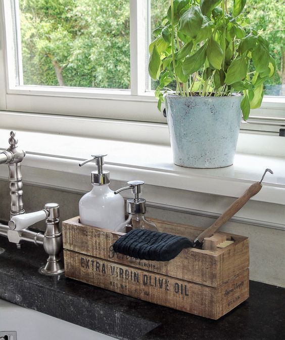 make an industrial rustic kitchen caddy of pallets and store soaps and other stuff there