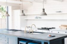 05 a trendy two-toned kitchen look can be achieved with a large kitchen island of a different color like here – a bold blue one