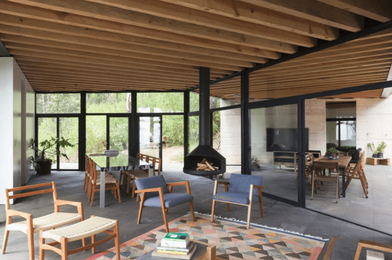 The living and dining room are all glazed from different sides, which fills the space with natural light and allows opening it to outdoors The living and dining room are all glazed from different sides, which fills the space with natural light and allows opening it to outdoors