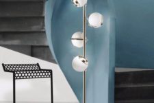 06 a chic mid-century floor lamp with a metal base and little spheres is a great idea for a hallway