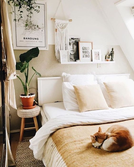 some macrame on the wall, a crocheted stool cover and greenery helps to make the space boho