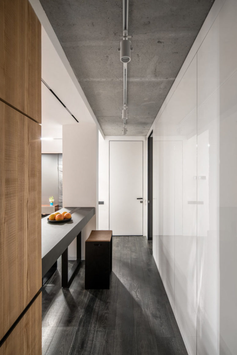 The storage spaces are hidden behind the doors to declutter the spaces as much as possible