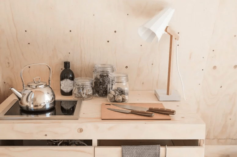 There's everything you may need including lights and a little cooker to make some food