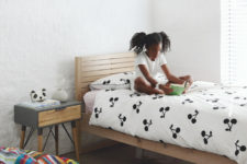 08 The kid’s bedroom is spruced up with a colorful bean bag and simple wooden furniture