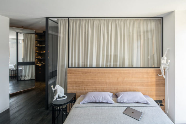 The master bedroom is a large space made up of four parts, a bedroom, a bathroom, a closet and an office