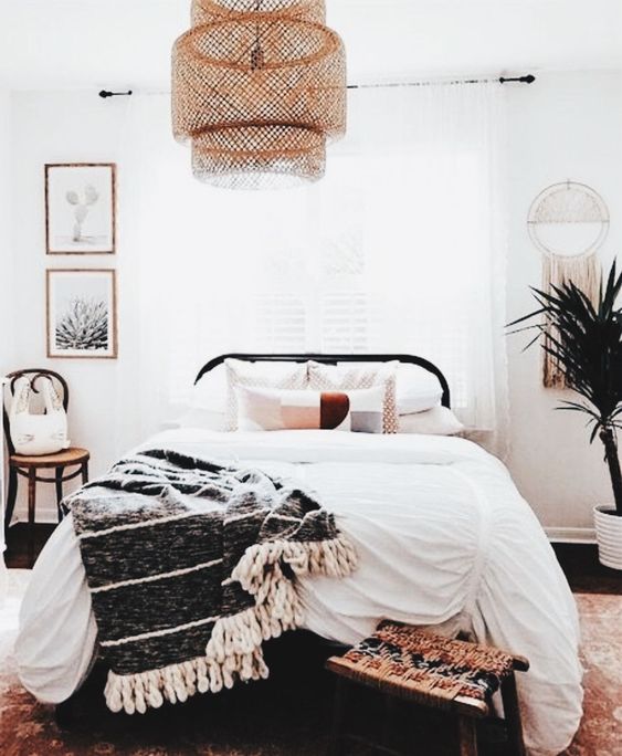 a wicker lampshades, a woven colorful stool, a crocheted blanket and a macrame hanging