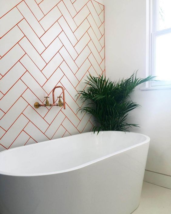 spruce up the chevron pattern with red grout and make your fixtures red to keep the theme