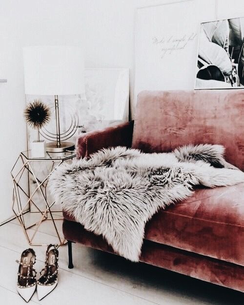 just one grey faux fur throw will instantly add luxury to the space