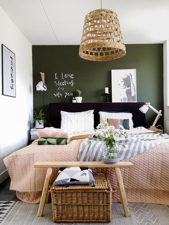 a dark green chalkboard wall makes the space more interesting and allows chalking on it