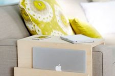 11 a minimalist plywood sofa caddy with a pocket for gadgets is a great piece for any living room