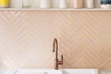 11 a pink chevron clad tile backsplash with neon yellow grout adds a bold touch to the kitchen