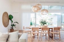 12 a large sofa and a rug to divide the living and the dining space seamlessly and elegantly