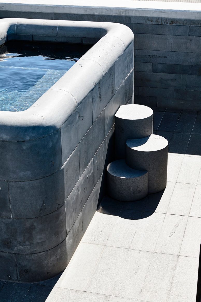There's also an outdoor stone-clad bathtub