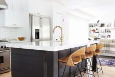 14 a contrasting black kitchen island with a sleek white countertop to connect it to the cabinets