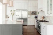 17 a traditional white kitchen with a grey kitchen island that adds a touch of color but not too much