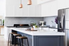 21 an elegant modern white kitchen with a grey kitchen island with a thick white countertop