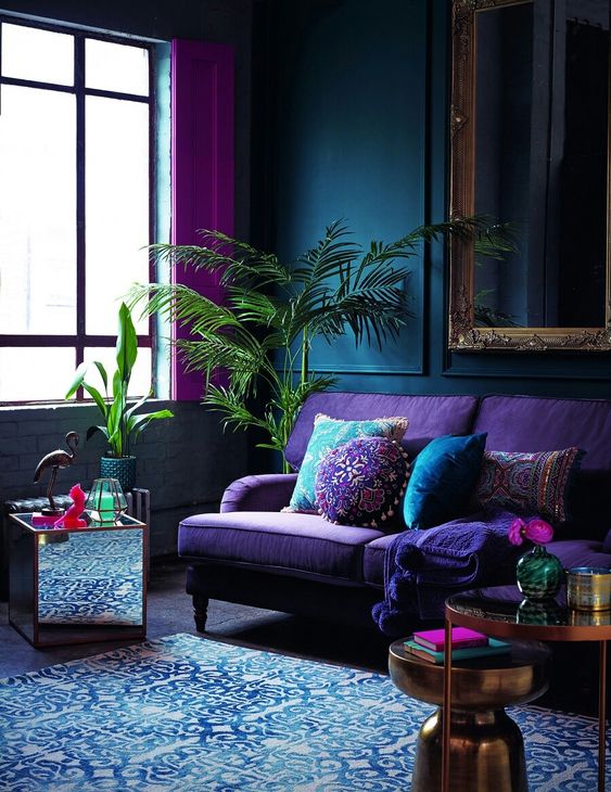 a decadent moody space with purple, teal, blue and fuchsia accents and a Moroccan feel