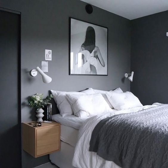 a large artwork is a good and easy statement, hang it over the bed