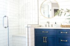 23 a navy vanity with brass touches is a chic idea for any bathroom, add brass fixtures to echo with it