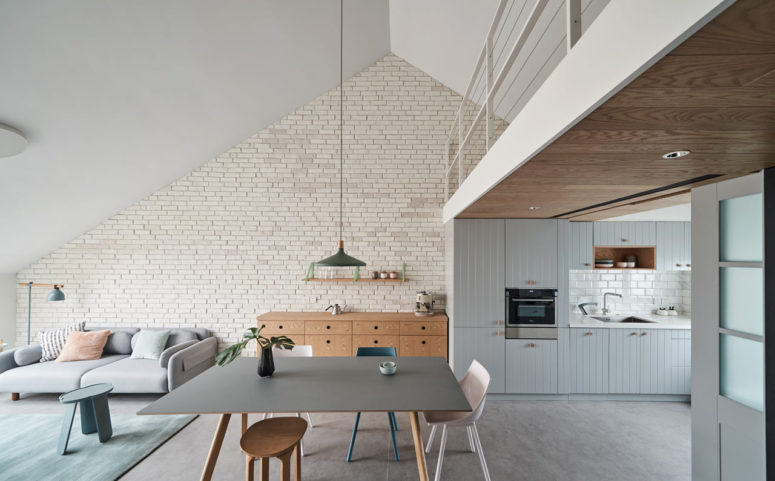 This spacious and light filled home in pastels is in Beijing, China, and was built for a family with a young kid