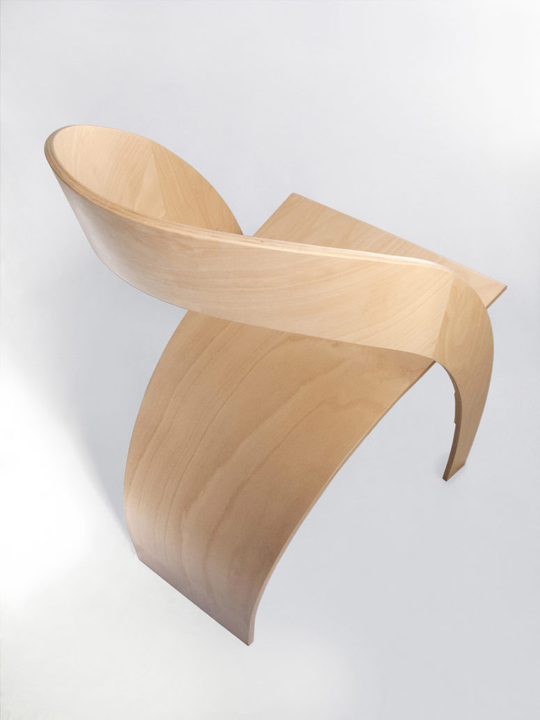 The chair features two bent pieces of plywood that are secured with a bracket