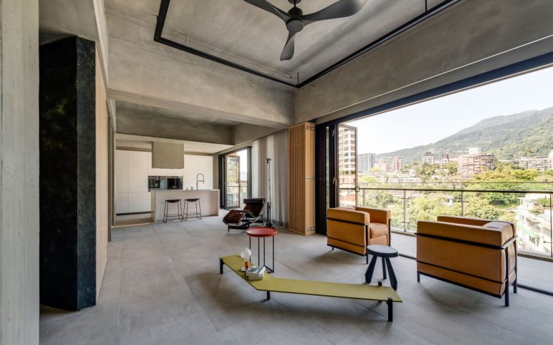 colorful furniture to make a statement The color palette is restraint and there's some colorful furniture and cool views featured