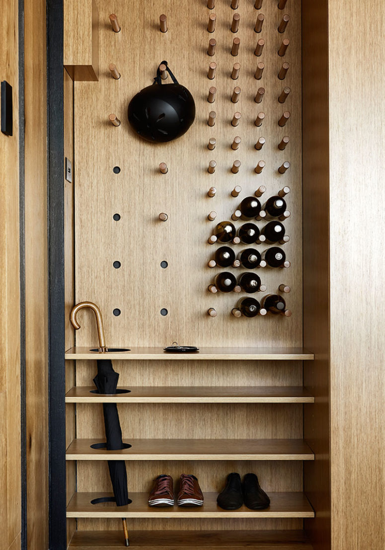 pegboard storage right in an entryway storage unit The entryway unit features a pegboard and some shelves