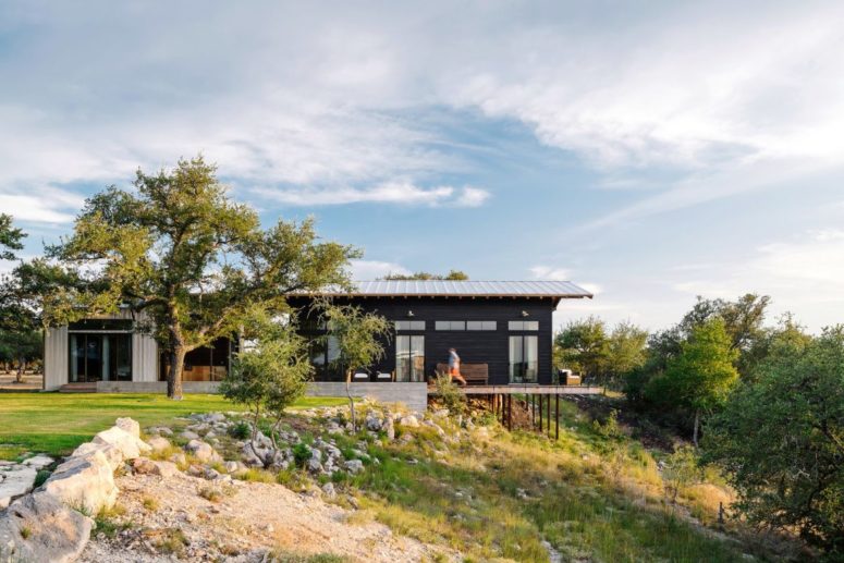 The house sits on the top of a bluff and overlooks a forest offering these views
