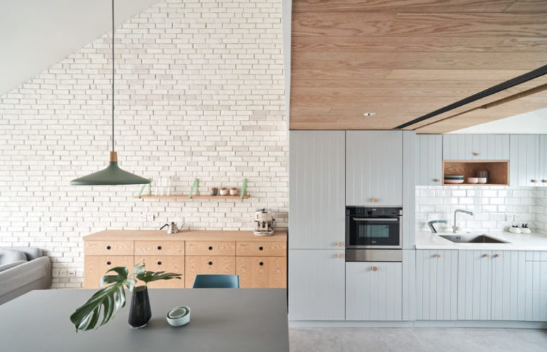 The main space is a large open layout with a kitchen, a dining space and a living room in one, all of them seamlessly flow into eahc other The main space is a large open layout with a kitchen, a dining space and a living room in one, all of them seamlessly flow into eahc other