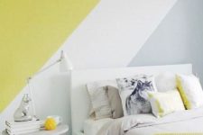 02 a color block wall in grey, white and mustard and a matching bedding set for more brightness