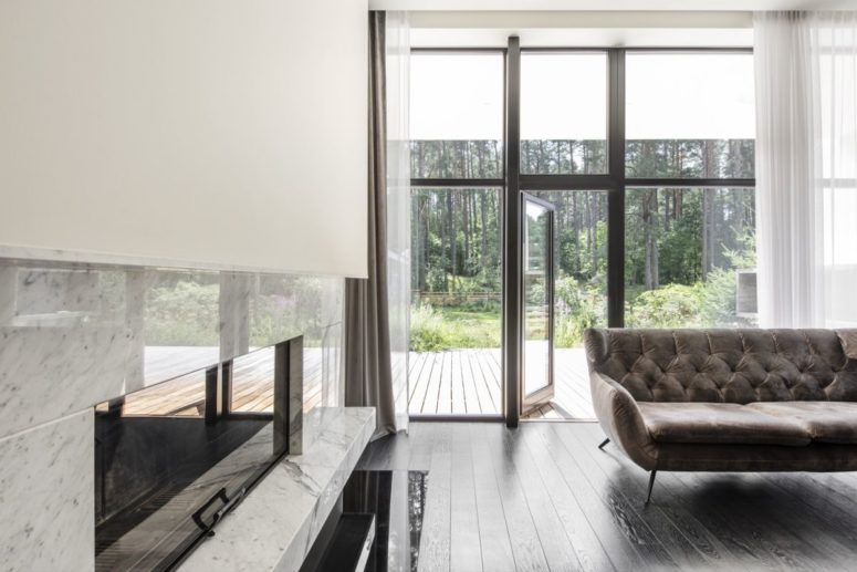 All the inner spaces have access to outdoor decks and bridges and feature glass walls to enjoy natural light