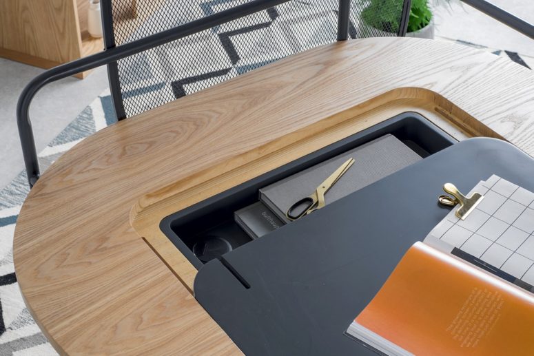 The desk features a hidden storage space that can be used for cables, various books, tablets and other stuff The desk features a hidden storage space that can be used for cables, various books, tablets and other stuff