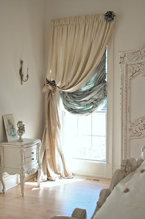 layered heavy silk curtains will make your window more insulated and you'll feel warmer