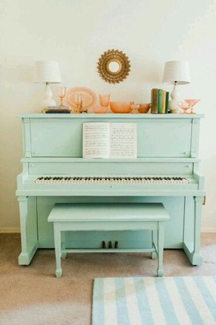 paint your piano some cool color, like mint here, and display some colorful glassware and lamps